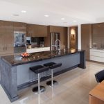 Use of a two-toned colour scheme — Dulux Jarrah and Dulux Self-Destruct for the cupboards to create elegant contrast.