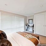 A bedroom by Renovating for Profit