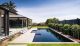 A contemporary outdoor pool by Elite Pools