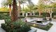 Formal meets tropical in this landscape design from Franklin Landscape & Design