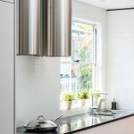 Pink, white and black kitchen design