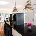 Pink, white and black kitchen design