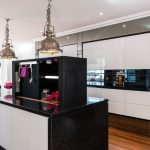 Pink, white and black kitchen design