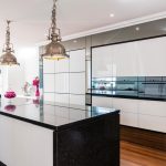 Pink, white and black kitchen design