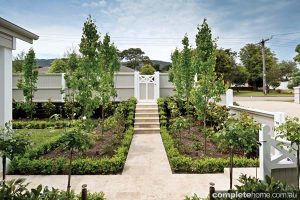 formal garden design with white gate
