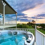 Cornwallis House 23 Spa on the mezzanine jacuzzi verandah at sunset