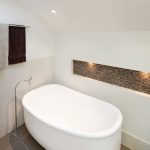 This New York themed bathroom located in Australia is eye-catching and spacious