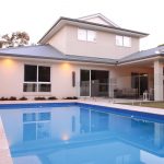 This modern pool and home design is clean and seamless