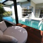 This outdoor room is perfect for poolside relaxation