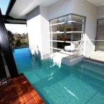 This pool and outdoor room create an amazing seamless indoor-outdoor feel