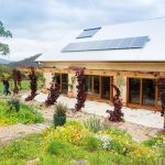 The home has a timeless, earthy aesthetic that merges beautifully with its bucolic surrounds