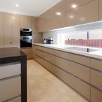 Functional kitchen with hidden laundry