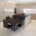 Functional kitchen with hidden laundry