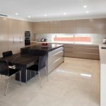 Functional kitchen with hidden laundry