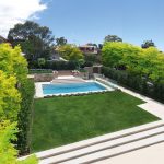 A modern pool in the middle of a garden