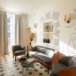 A casual sitting area in the foyer invites visitors to admire the artwork