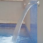 An outdoor/pool design with alfresco