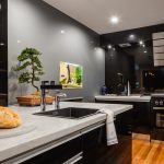 A kitchen with butcher’s block, deep fryer and chargrill plate