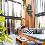 The sprawling green wall is a point of difference for this South Yarra apartment