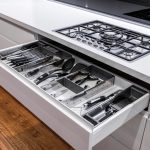 Storage has been seamlessly integrated into this kitchen's design