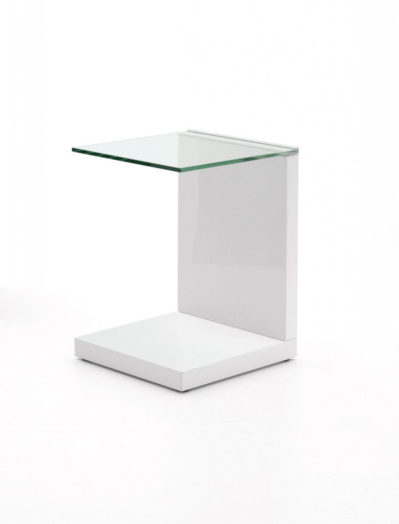 The Hula side table combines monumental design with modernity. The glossy white base and stand works well with the glass cantilevered surface for sculptural appeal. beyondfurniture.com.au