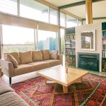 The use of bright furnishings in the living area creates instant warmth and energy