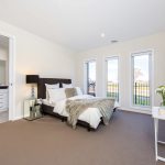 The look of a neutral bedroom can be changed seasonally through accessories