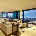 Views of the city can be enjoyed from all angles in the living area