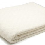 White angora throw 
by Bemboka, $235, petersofkensington.com.au