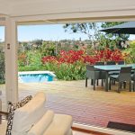 PSS024_Cabanas Feature_attached outdoor room with a view of the pool
