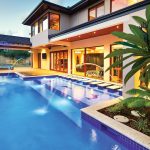 This stylish, modern pool features an amazing vertical raindrop water feature