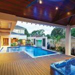 This stylish, modern pool features an amazing vertical raindrop water feature