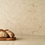 The warm hues of the Taj Royal from CAESARSTONE make any room inviting. Showcase the delicate veins, rich depth and soft texture as a feature wall, splashback or go crazy and cover all four walls. caesarstone.com.au