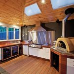 A kitchen designed and built for year-round entertaining. Photo courtesy of Pergolas R Us.