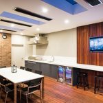 A fully equipped outdoor kitchen and entertaining area. Photo courtesy of Apex Landscapes.
