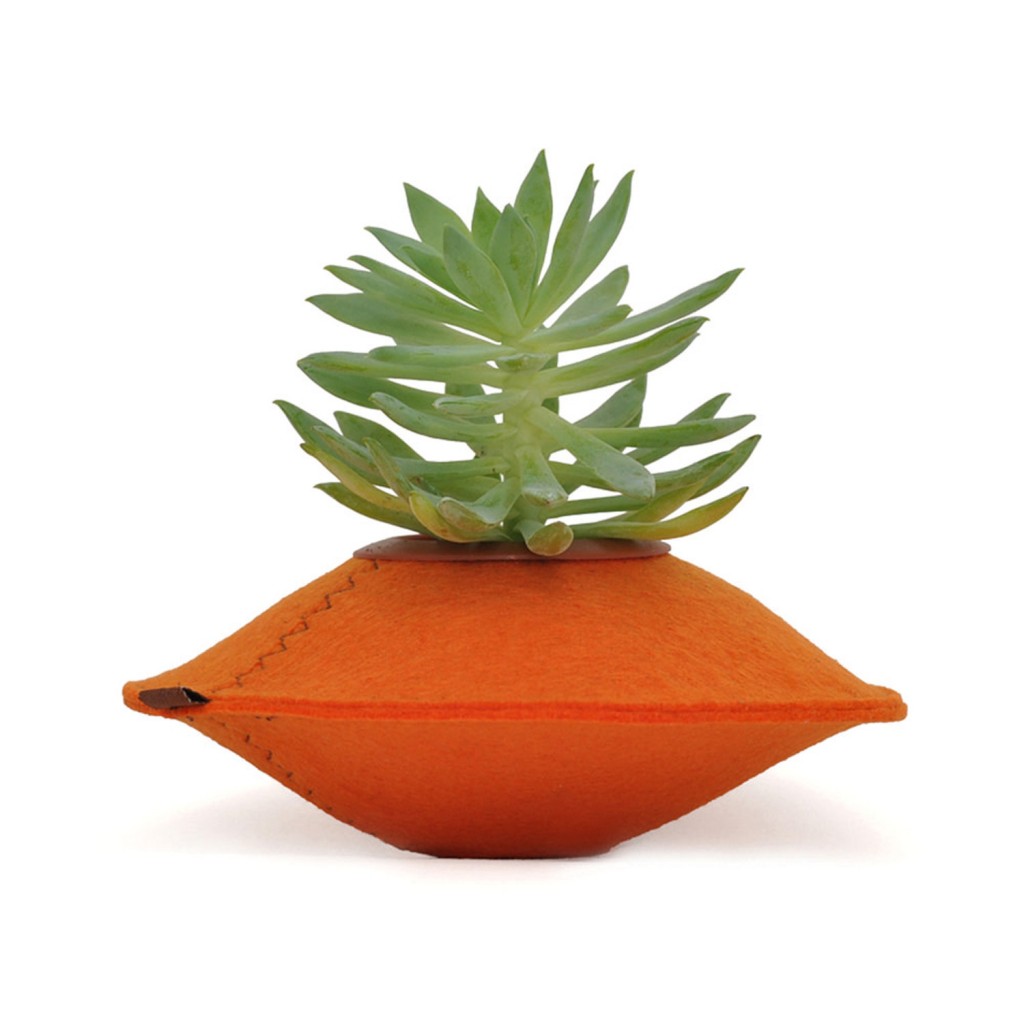 An orange felt planter pot from Down That Little Lane www.downthatlittlelane.com.au