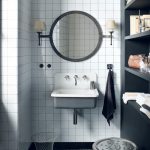 The Corian Energy basin is encased in a shell made from Corian Deep Titanium and fitted with traditional utilitarian taps in a design that both enhances the industrial look of a loft-style apartment and blends with its monochromatic decor.