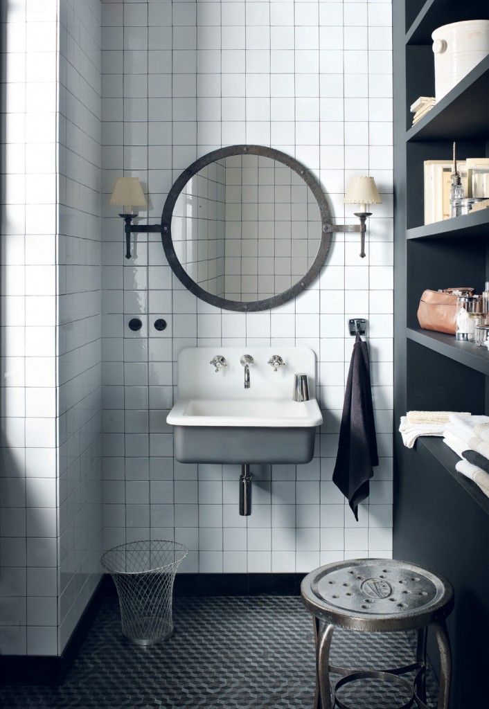 The Corian Energy basin is encased in a shell made from Corian Deep Titanium and fitted with traditional utilitarian taps in a design that both enhances the industrial look of a loft-style apartment and blends with its monochromatic decor.