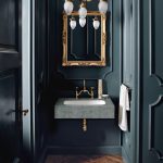 The earthy tones of Corian Lava Rock wrap seamlessly around the Corian Peace basin, making an intriguing contrast with the traditional parquetry flooring. Paired with ornate taps, this eclectic combination refreshes the elegant interior of an urban townhouse.