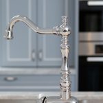 This compact kitchen design makes up for space by incorporating cupboards and drawers within a U-shaped bench