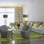 Citrus tones pop against the neutral flooring and wall feature