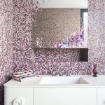 A colourful finish on the bathroom mirror packs a punch