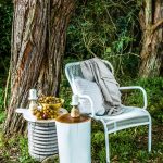 Granada Loop occasional chair in white, Piper linen throw in Natural, Barnet Zig Zag cushion in Ivory Grey, Granada Ripple stool in Drift, Venus marble and wood cheeseboard, Tilda Dimple bowl in brass, Venus timber candle holders and Brooklyn log stool in white. globewest.com.au