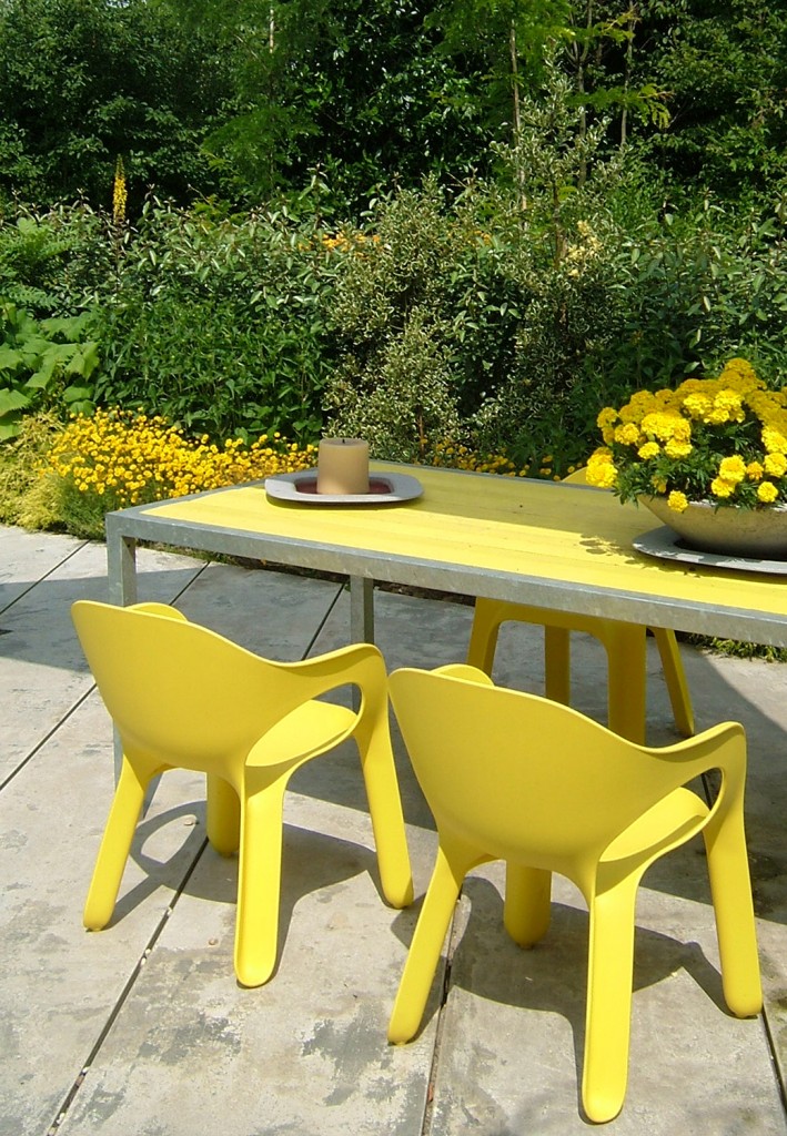 yellow chairs in garden