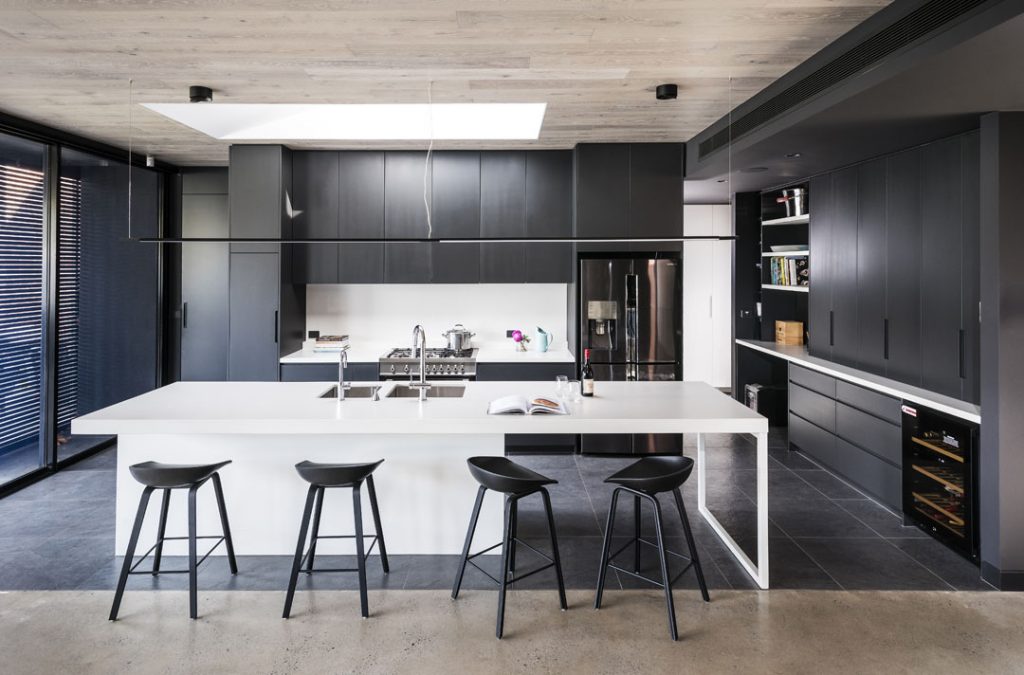 The dazzling darkness of this black and white kitchen