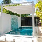 Somerton Park Beach House: a courtyard pool with an innovative shade solution