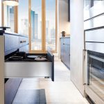 Long shot of a contemporary grey drawer by Blum