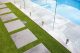 Modern front and rear gardens exceed expectations.