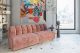 This modular sofa in blush pink tones steals the show