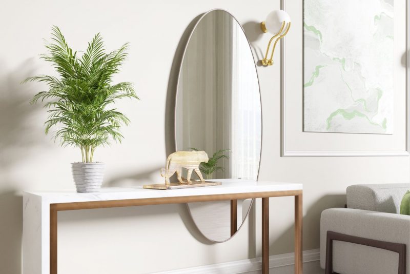 Make a statement with a large mirror to capture the light. caffelattehome.com